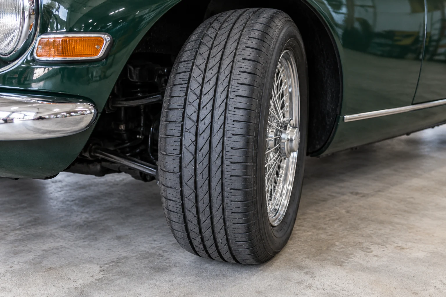 Outward-turned front wheel with tread and sidewall visible